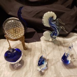 Cobalt blue and glass figurines and one stand